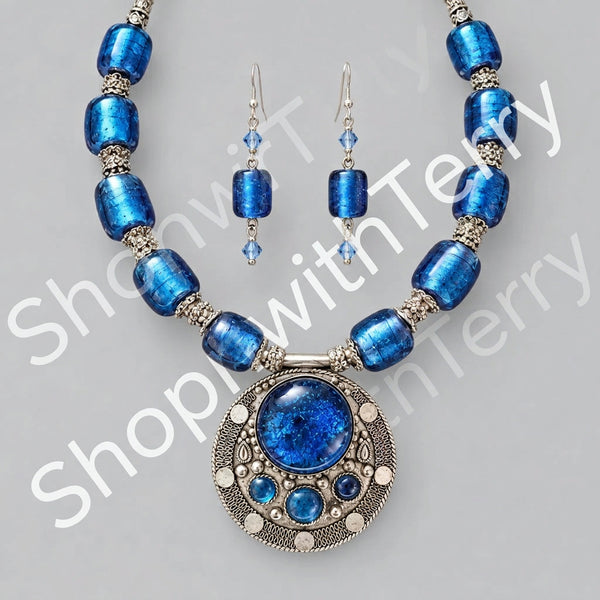 #BlueBeadNecklace #HandcraftedJewelry #LampBeads #CobaltBlue #ArtisanalStyle #JewelrySet #UniqueAccessories #GlassBeads #StatementNecklace #ElegantStyle #JewelryLovers #HandmadeWithLove #ColorfulJewelry #VersatileStyle #ShopSmallBusiness #JewelryDesign #BlueJewels #AccessorizeInStyle #SpecialOccasion #EverydayGlam